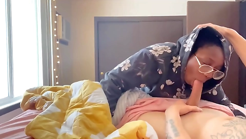 A mature brunette and ebony teen have fun in a porn scene