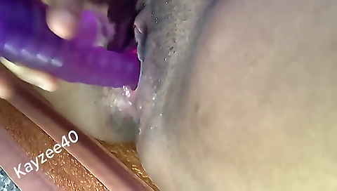 Ebony milf gets to play with toys on her hairy pussy