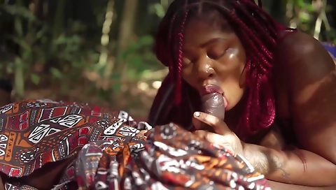 Big ass ebony lady with a big cock is getting fucked