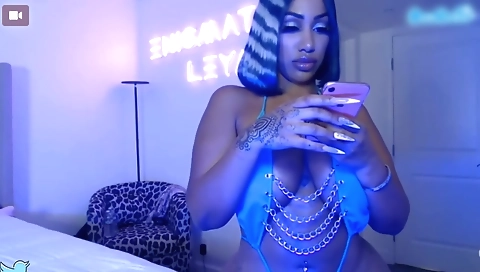 Sexy black lingerie stripper is stripping in the web cam