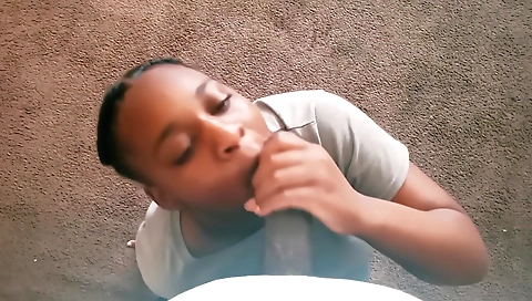 Busty ebony sucking and rubbing a huge cock in pov porn video