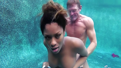 Brunette plays with a black big cock and gets a facial