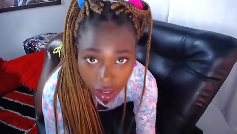 Ebony babe with a big ass gives a blowjob to her white lover