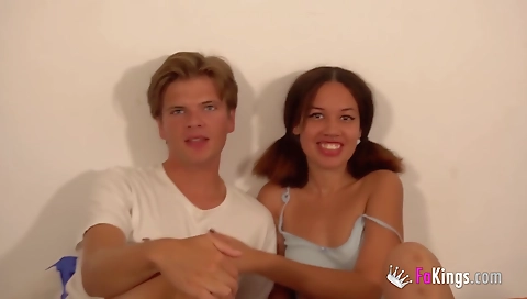 Ebony teen girl with a tattooed pussy is giving a blowjob