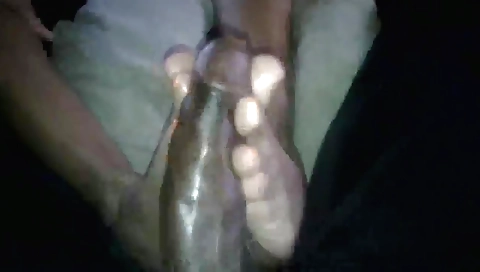 Ebony girl with a large booty fucks her pussy on the couch