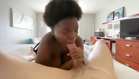 Ebony girl takes a big black cock deep in her mouth