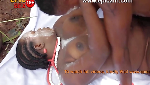 Ebony chick fucks a large dick outdoors in the woods