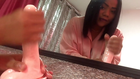 Ebony slut with a big booty plays with her tiny toy