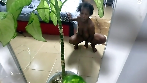 Busty ebony milf with a huge ass fucks herself with a dildo