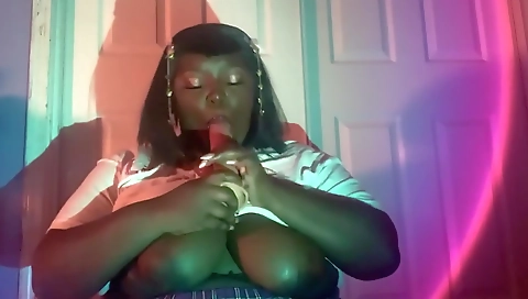 Sexy brunette plays with her big boobs with a dildo