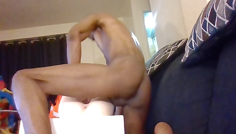 Ebony babe is getting anal toy and a handjob on her ass